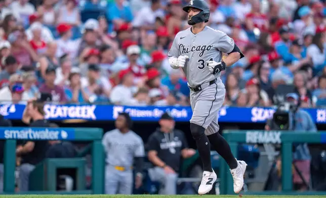 Chicago White Sox's Randal Grichuk rounds the bases after hitting a solo home run during the third inning of a baseball game against the Philadelphia Phillies, Friday, June 5, 2026, in Philadelphia. (AP Photo/Chris Szagola)