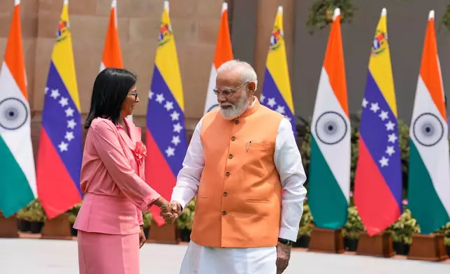 Indian Prime Minister Narendra Modi, right, welcomes Venezuela's acting President Delcy Rodriguez as she arrives for a meeting in New Delhi, India, Thursday, June 4, 2026. (AP Photo/Manish Swarup)