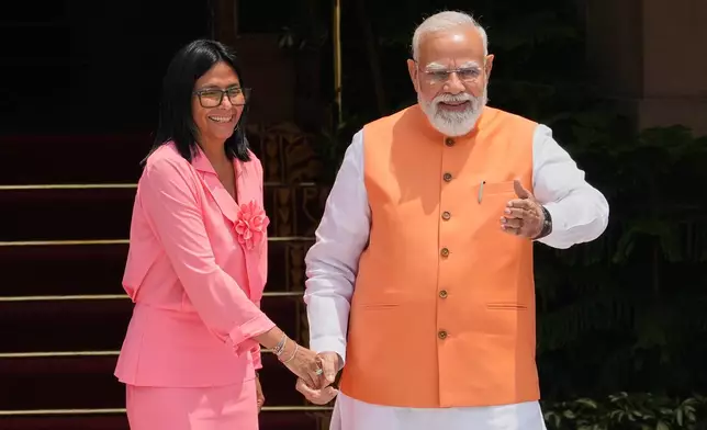 Indian Prime Minister Narendra Modi welcomes Venezuela's acting President Delcy Rodriguez as she arrives for a meeting in New Delhi, India, Thursday, June 4, 2026. (AP Photo/Manish Swarup)