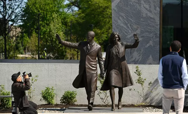 Statues of former President Barack Obama and former First Lady Michelle Obama at the Obama Presidential Center in Chicago, Thursday, May 28, 2026. (AP Photo/Paul Beaty)