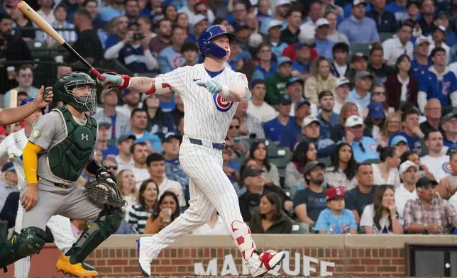 Chicago Cubs' Pete Crow-Armstrong hits a two-run against the Athletics during the third inning in a baseball game Wednesday, June 3, 2026, in Chicago. (AP Photo/David Banks)