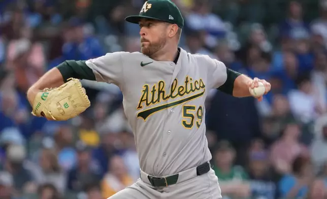 Athletics pitcher Jeffrey Springs throws the ball against the Chicago Cubs during the first inning in a baseball game Wednesday, June 3, 2026, in Chicago. (AP Photo/David Banks)
