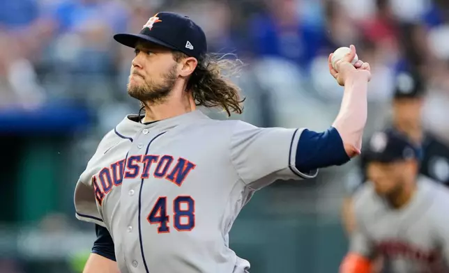 Houston Astros pitcher Steven Okert throws during the first inning of a baseball game against the Kansas City Royals, Friday, June 12, 2026, in Kansas City, Mo. (AP Photo/Charlie Riedel)