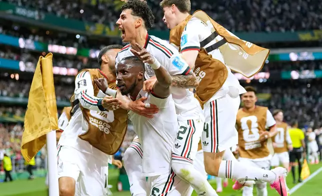 Mexico's Julian Quinones celebrates scoring his side's second goal against Czechia during a World Cup Group A soccer match in Mexico City, Wednesday, June 24, 2026. (AP Photo/Silvia Izquierdo)