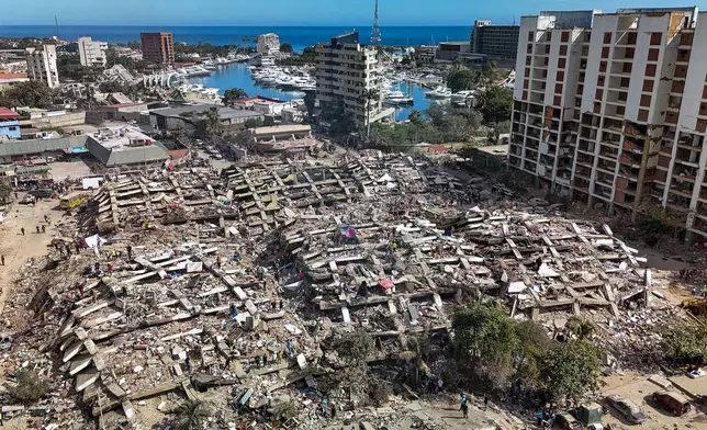 Buildings are collapsed and damaged along the coast in Caraballeda, La Guaira state, Venezuela, Sunday, June 28, 2026, following earthquakes. (Miguel Medina, Pool photo via AP)