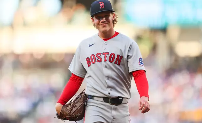 Boston Red Sox pitcher Connelly Early reacts after the fourth inning of a baseball game against the Seattle Mariners, Saturday, June 20, 2026, in Seattle. (AP Photo/Kevin Ng)