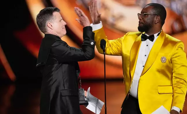 Bill Rauch, left, and Zhailon Levingston accept the award for best direction of a musical for "Cats: The Jellicle Ball" during the 79th Tony Awards on Sunday, June 7, 2026, at Radio City Music Hall in New York. (Photo by Charles Sykes/Invision/AP)