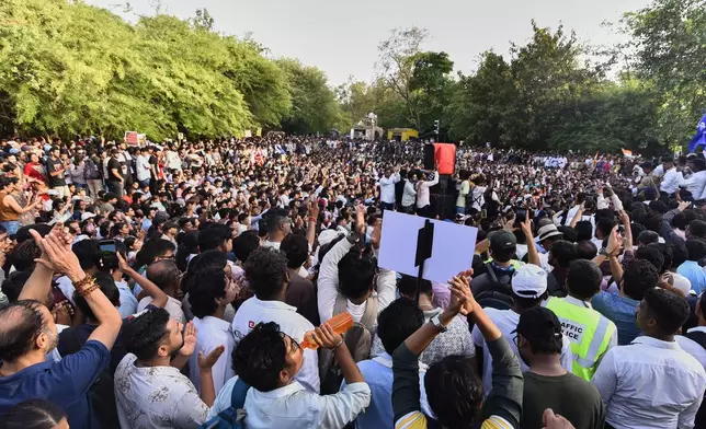 Protesters shout slogans during a nationwide protest campaign launched by Abhijeet Dipke, founder of the Cockroach Janta Party, in Pune, India, Thursday, June 11, 2026. (AP Photo/Mahendra Kolhe)