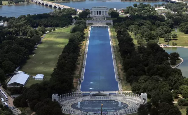 The Lincoln Memorial and the Reflecting Pool are seen from the Washington Monument, Wednesday, June 24, 2026, in Washington. (AP Photo/Rahmat Gul)