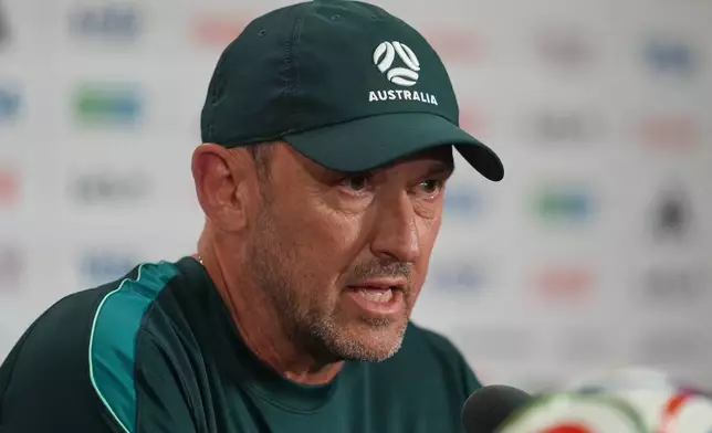 Australia's head coach Tony Popovic answers a question during a press conference, Friday, June 12, 2026, in Vancouver, British Columbia, ahead of the team's World Cup soccer match against Turkey. (AP Photo/Abbie Parr)