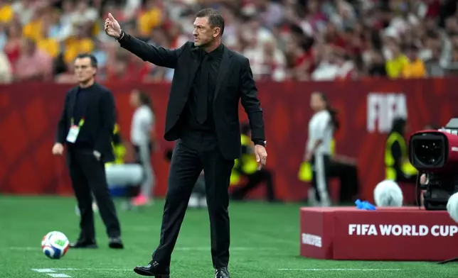 Australia head coach Tony Popovic gestures during the World Cup Group D soccer match between Australia and Turkey in Vancouver, British Columbia, Saturday, June 13, 2026. (AP Photo/Abbie Parr)