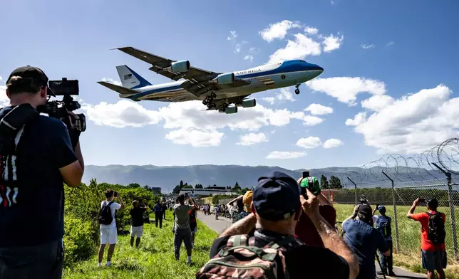 Air Force One carrying President Donald Trump landing at Geneva Airport ahead of the G7 summit, in Geneva, Switzerland, Monday, June 15, 2026. (Jean-Christophe Bott, Pool Photo via AP)