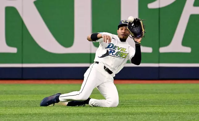 Tampa Bay Rays left fielder Chandler Simpson catches a line drive hit by Washington Nationals' Jorbit Vivas, not pictured, during the second inning of a baseball game Friday, June 19, 2026, in St. Petersburg, Fla. (AP Photo/Jason Behnken)