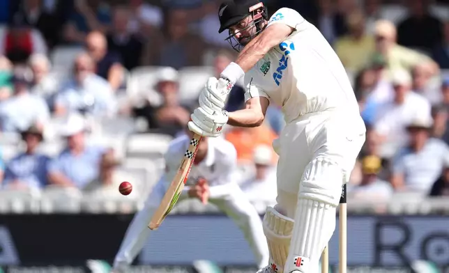 New Zealand's Daryl Mitchell in action on day one of the second cricket test between England and New Zealand in London, Wednesday, June 17, 2026. (Ben Whitley/PA via AP)