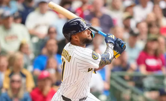 Milwaukee Brewers' Jackson Chourio hits a home run during the first inning of a baseball game against the Philadelphia Phillies, Sunday, June 14, 2026, in Milwaukee. (AP Photo/Kayla Wolf)