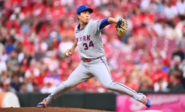 New York Mets pitcher Kodai Senga throws during the first inning of a baseball game against the Cincinnati Reds in Cincinnati, Tuesday, June 16, 2026. (AP Photo/Ben Jackson)