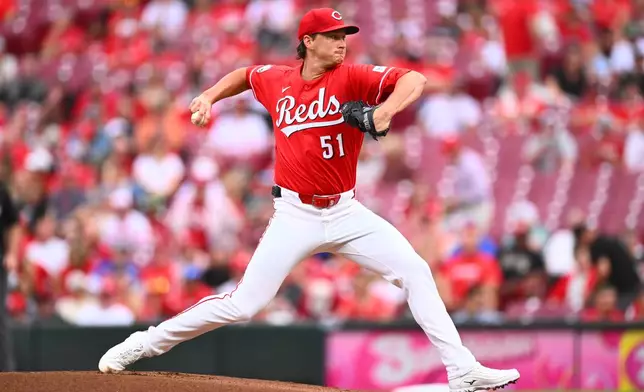 Cincinnati Reds pitcher Brady Singer throws during the first inning of a baseball game against the New York Mets in Cincinnati, Tuesday, June 16, 2026. (AP Photo/Ben Jackson)