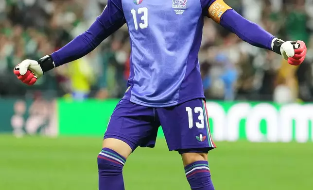 Mexico goalkeeper Guillermo Ochoa (13) celebrates after teammate Alvaro Fidalgo (8) scored their third goal during the World Cup Group A soccer match between Czechia and Mexico in Mexico City, Wednesday, June 24, 2026. (AP Photo/Fernando Llano)