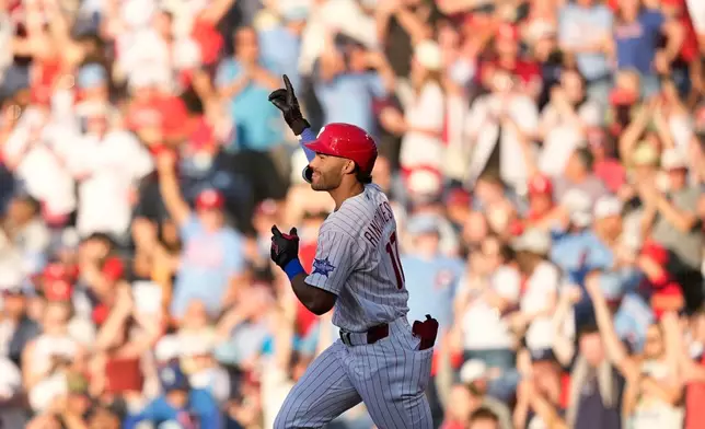 Philadelphia Phillies' Gabriel Rincones Jr. reacts after hitting a home run against Miami Marlins pitcher Ryan Gusto during the second inning of a baseball game Monday, June 15, 2026, in Philadelphia. (AP Photo/Matt Slocum)