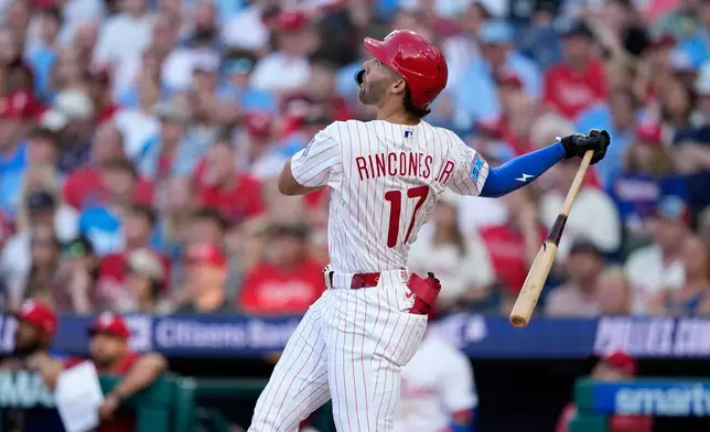Philadelphia Phillies' Gabriel Rincones Jr. watches after hitting a home run against Miami Marlins pitcher Ryan Gusto during the second inning of a baseball game Monday, June 15, 2026, in Philadelphia. (AP Photo/Matt Slocum)