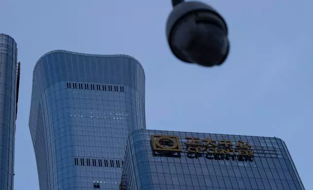 The surface of the Citic Tower also known as Zun Tower is damaged in Beijing, China, Friday, June 26, 2026. (AP Photo/Han Guan Ng)