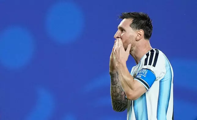 Argentina's Lionel Messi reacts after scoring his third goal during the World Cup Group J soccer match between Argentina and Algeria in Kansas City, Mo., Tuesday, June 16, 2026. (AP Photo/Charlie Riedel)
