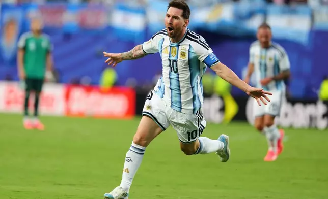 Argentina's Lionel Messi (10) celebrates after scoring the opening goal during the World Cup Group J soccer match between Argentina and Algeria in Kansas City, Mo., Tuesday, June 16, 2026. (AP Photo/Ed Zurga)