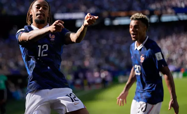 France's Bradley Barcola celebrates after scoring his side's second goal during the World Cup Group I soccer match between France and Senegal in East Rutherford, N.J., near New York, Tuesday, June 16, 2026. (AP Photo/Frank Franklin II)