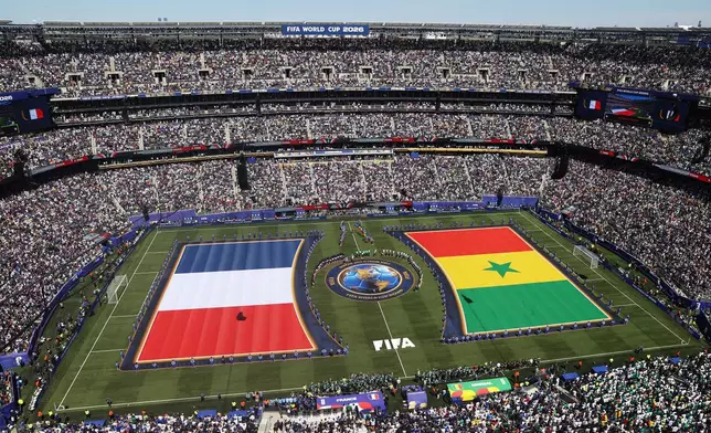 Players stand for the National Anthem during the World Cup Group I soccer match between France and Senegal in East Rutherford, N.J., near New York, Tuesday, June 16, 2026. (AP Photo/Pamela Smith)