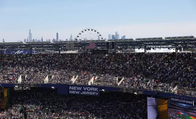 The New York Ciry skyline is seen behind the stadium during the World Cup Group I soccer match between France and Senegal in East Rutherford, N.J., near New York, Tuesday, June 16, 2026. (AP Photo/Pamela Smith)
