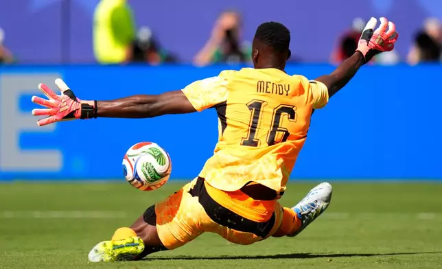 Senegal goalkeeper Edouard Mendy saves the ball during the World Cup Group I soccer match between France and Senegal in East Rutherford, N.J., near New York, Tuesday, June 16, 2026. (AP Photo/Frank Franklin II)