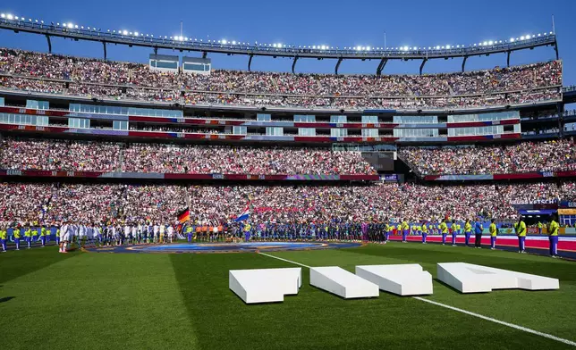 Players stand for the national anthem before the World Cup round of 32 soccer match between Germany and Paraguay in Foxborough, Mass., near Boston, Monday, June 29, 2026. (AP Photo/Martin Meissner)