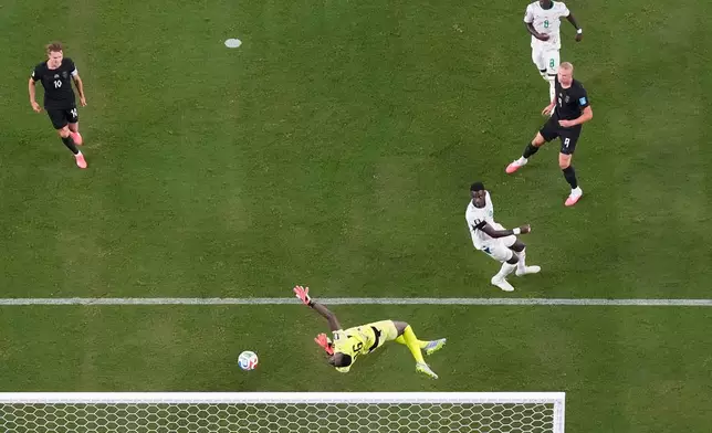 Norway's Erling Haaland (9) scores their third goal during the World Cup Group I soccer match between Norway and Senegal in East Rutherford, N.J., near New York, Monday, June 22, 2026. (AP Photo/Stephen Collingwood)