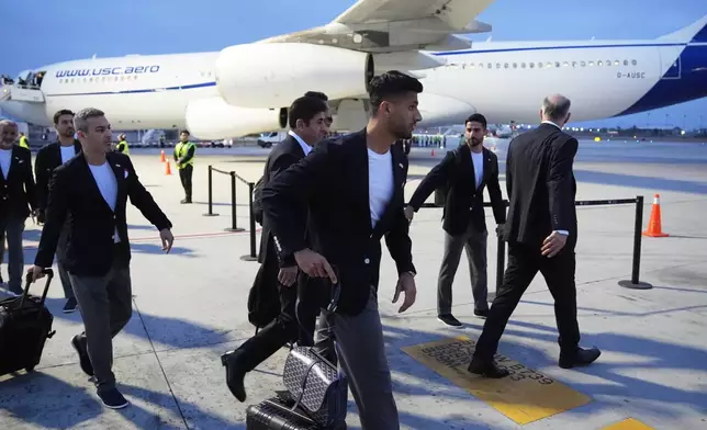 Players for Iran arrive for the World Cup soccer tournament in Tijuana, Mexico, Sunday, June 7, 2026. (AP Photo/Gregory Bull)