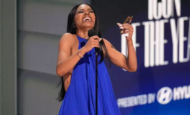 Teyana Taylor accepts the Icon of the Year award during the BET Awards on Sunday, June 28, 2026, at the Peacock Theater in Los Angeles. (AP Photo/John Locher)