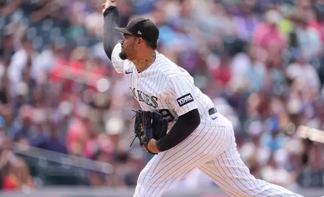 Colorado Rockies relief pitcher Antonio Senzatela works against the Boston Red Sox in the seventh inning of a baseball game Wednesday, June 24, 2026, in Denver. (AP Photo/David Zalubowski)