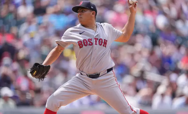Boston Red Sox starting pitcher Ranger Suarez works against the Colorado Rockies in the sixth inning of a baseball game Wednesday, June 24, 2026, in Denver. (AP Photo/David Zalubowski)