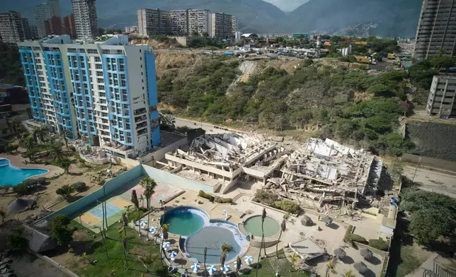 Collapsed buildings stand a day after earthquakes struck La Guaira, Venezuela, Thursday, June 25, 2026. (AP Photo/Juan Pablo Arraez)