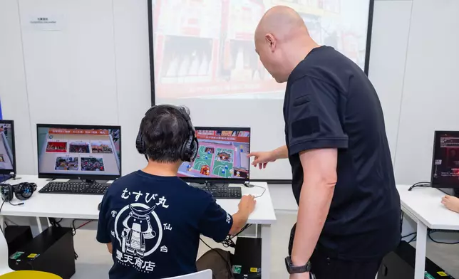 Participants can also experience the MR platform through a computer. Photo source: HKSYU