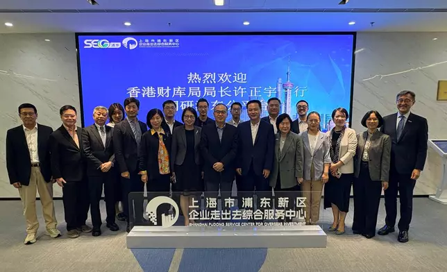 The Secretary for Financial Services and the Treasury, Mr Christopher Hui, and the financial delegation arrived in Shanghai and visited the Shanghai Pudong Service Center for Overseas Investment yesterday (June 17). Photo shows Mr Hui (front row, centre); the Permanent Secretary for Financial Services and the Treasury (Financial Services), Mrs Angelina Cheung (front row, sixth left); the Director-General of Investment Promotion of Invest Hong Kong, Ms Alpha Lau (front row, fifth right); the Director-General of the Office for Attracting Strategic Enterprises, Mr Peter Yan (front row, first right), and members of the delegation with Vice Mayor of Pudong New Area Mr Xu Xin (front row, sixth right). Source: HKSAR Government Press Releases