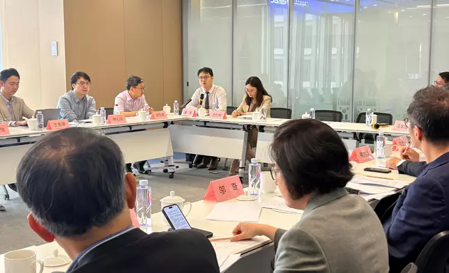 The Secretary for Financial Services and the Treasury, Mr Christopher Hui, and the financial delegation arrived in Shanghai and visited the Shanghai Pudong Service Center for Overseas Investment yesterday (June 17). Photo shows representatives of Chinese Mainland enterprises exchanging views with members of the delegation in a seminar. Source: HKSAR Government Press Releases