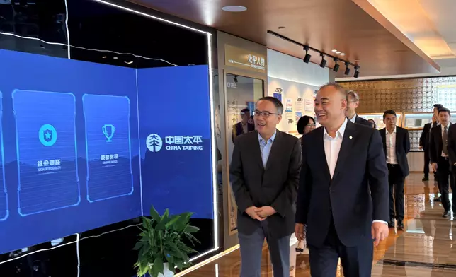 The Secretary for Financial Services and the Treasury, Mr Christopher Hui, and the financial delegation continued their visit to Shanghai and visited the China Taiping Insurance Group today (June 18). Photo shows Mr Hui (first left) and members of the delegation on a visit to understand the company's overall development and its support to Hong Kong’s development as an international financial centre. With Mr Hui is the China Taiping Insurance Group Vice Chairman and General Manager, Mr Li Kedong (second left). Source: HKSAR Government Press Releases