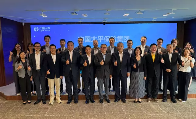 The Secretary for Financial Services and the Treasury, Mr Christopher Hui, and the financial delegation continued their visit to Shanghai and visited the China Taiping Insurance Group today (June 18). Photo shows Mr Hui (front row, centre) and members of the delegation with the China Taiping Insurance Group Vice Chairman and General Manager, Mr Li Kedong (front row, fifth right), and other senior management. Source: HKSAR Government Press Releases