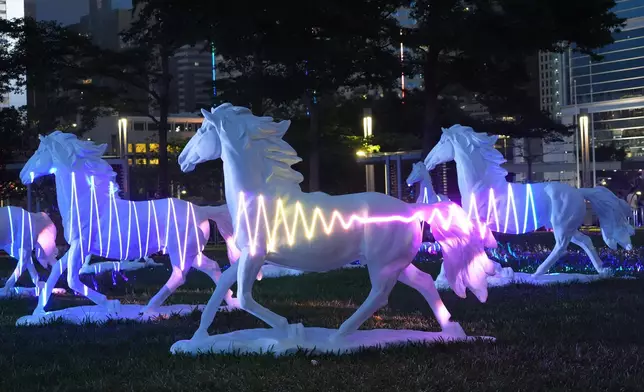 The Community Exhibition at Tamar Park presents a nighttime horse themed light show with multimedia projections in the evening on Fridays to Sundays. At the launch ceremony, a special visual art performance was staged to mark the occasion. Photo source: HKJC