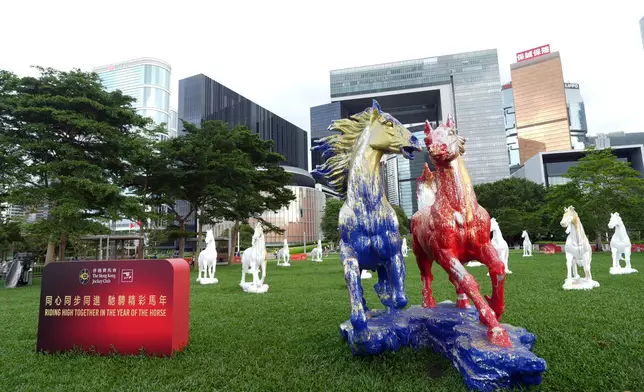 Horse sculptures created by artist Simon Ma and mini “Harmonious Horse” sculptures painted by public are currently on display at Tamar Park in Admiralty until 28 June. Photo source: HKJC