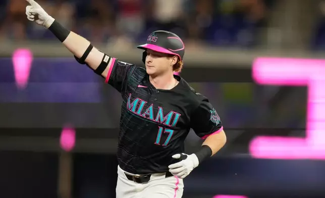 Miami Marlins' Owen Caissie runs the bases after hitting a solo home run during the first inning of a baseball game against the San Francisco Giants, Friday, June 19, 2026, in Miami. (AP Photo/Lynne Sladky)