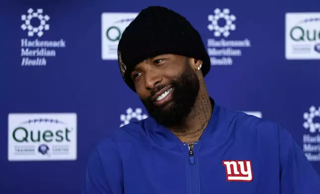 New York Giants wide receiver Odell Beckham Jr. speaks to the media after an NFL football practice Wednesday, June 3, 2026, in East Rutherford, N.J. (AP Photo/Adam Hunger)