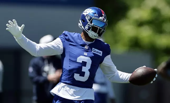 New York Giants wide receiver Odell Beckham Jr. (3) reacts during an NFL football practice Wednesday, June 3, 2026, in East Rutherford, N.J. (AP Photo/Adam Hunger)