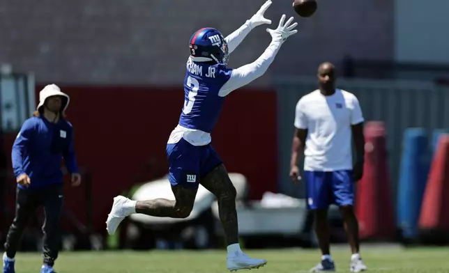 New York Giants wide receiver Odell Beckham Jr. (3) makes a catch during an NFL football practice Wednesday, June 3, 2026, in East Rutherford, N.J. (AP Photo/Adam Hunger)