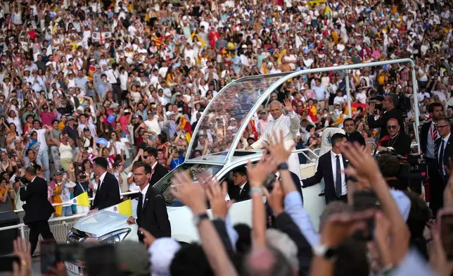 Pope Leo XIV arrives to attend a prayer vigil at Lluis Companys Olympic Stadium in Barcelona, Spain, Tuesday, June 9, 2026. (AP Photo/Emilio Morenatti)